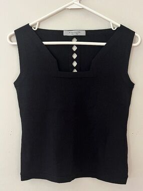 D. Exterior Sleeveless Black Tank Top with Cutout Design